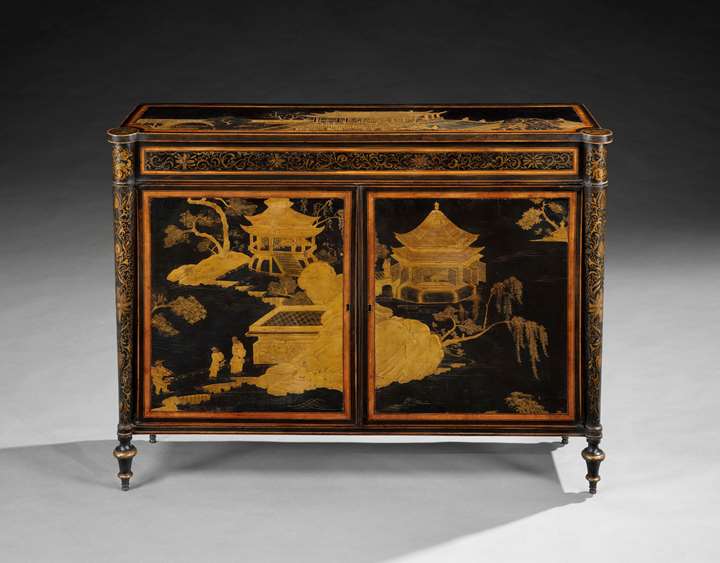 A rare satinwood and ebony side cabinet with inset panels of Chinese lacquer